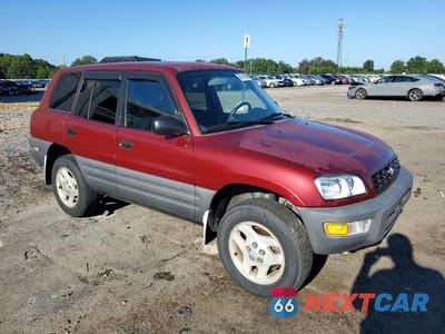 Czwarte zdjęcie samochodu z boku: 1999 TOYOTA RAV4 BASE VIN:JT3HP10V6X7136722 - miniatura