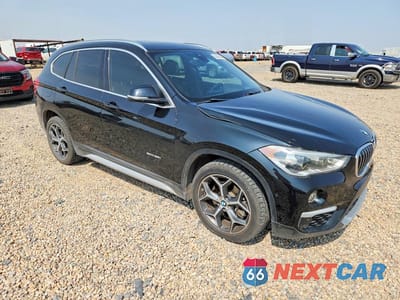 Czwarte zdjęcie samochodu z boku: 2017 BMW X1 SDRIVE28I VIN:WBXHU7C30H5H34552 - miniatura