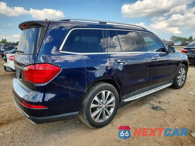 Trzecie zdjęcie samochodu z tyłu: 2016 MERCEDES-BENZ GL 450 4MATIC VIN:4JGDF6EE4GA703043 - miniatura