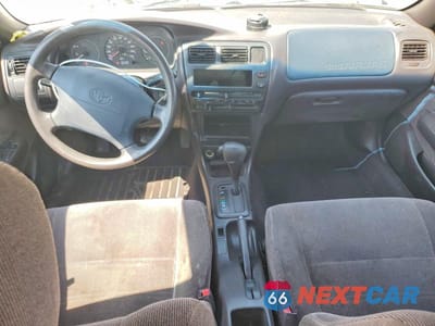 Zdjęcie 8 z 12 samochodu: 1994 TOYOTA COROLLA DX VIN:1NXAE09B6RZ204099 - miniatura