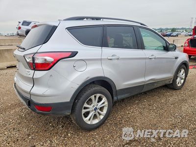 Trzecie zdjęcie samochodu z tyłu: 2018 FORD ESCAPE SE VIN:1FMCU0GD2JUD16242 - miniatura