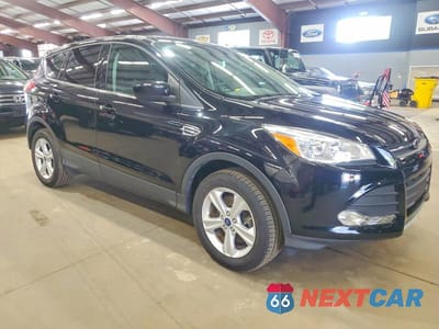 Czwarte zdjęcie samochodu z boku: 2016 FORD ESCAPE SE VIN:1FMCU9GX6GUA34208 - miniatura