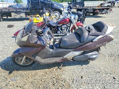 Trzecie zdjęcie samochodu z tyłu: 2004 HONDA FSC600 D VIN:JH2PF01184K200663 - miniatura
