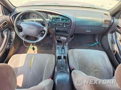Zdjęcie 8 z 12 samochodu: 1996 TOYOTA CAMRY LE VIN:JT2BG12K1T0415205 - miniatura
