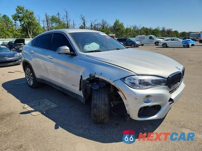 Czwarte zdjęcie samochodu z boku: 2019 BMW X6 SDRIVE35I VIN:5UXKU0C54K0H98947 - miniatura
