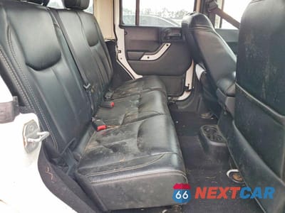 Zdjęcie 11 z 13 samochodu: 2014 JEEP WRANGLER UNLIMITED SAHARA VIN:1C4HJWEG8EL182450 - miniatura