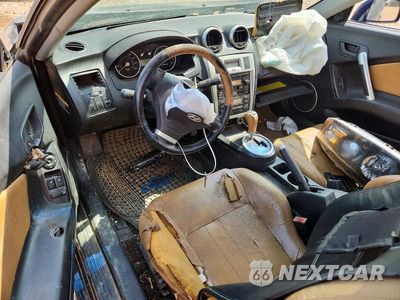 Zdjęcie 8 z 12 samochodu: 2006 HYUNDAI TIBURON GT VIN:KMHHN65F16U190487 - miniatura