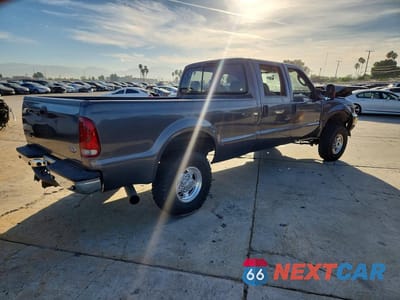 Trzecie zdjęcie samochodu z tyłu: 2004 FORD F250 SUPER DUTY VIN:1FTNW21P44EE03340 - miniatura