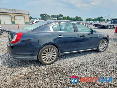 Trzecie zdjęcie samochodu z tyłu: 2013 LINCOLN MKS VIN:1LNHL9DKXDG602312 - miniatura