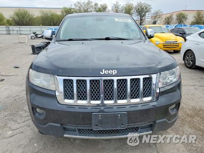 Piąte zdjęcie samochodu w środku: 2013 JEEP GRAND CHEROKEE OVERLAND VIN:1C4RJECT1DC533888 - miniatura