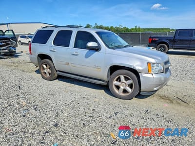 Czwarte zdjęcie samochodu z boku: 2011 CHEVROLET TAHOE C1500 LT VIN:1GNSCBE05BR293498 - miniatura