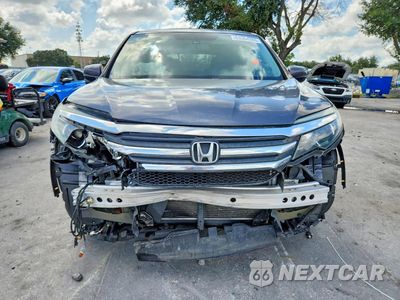 Piąte zdjęcie samochodu w środku: 2017 HONDA PILOT EXL VIN:5FNYF5H50HB047458 - miniatura