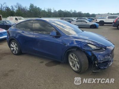 Czwarte zdjęcie samochodu z boku: 2020 TESLA MODEL Y VIN:5YJYGDEE2LF045263 - miniatura