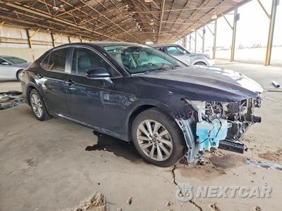 Czwarte zdjęcie samochodu z boku: 2022 TOYOTA CAMRY LE VIN:4T1C11AK9NU661554 - miniatura