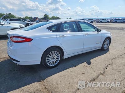 Trzecie zdjęcie samochodu z tyłu: 2016 FORD FUSION SE HYBRID VIN:3FA6P0LU0GR310394 - miniatura