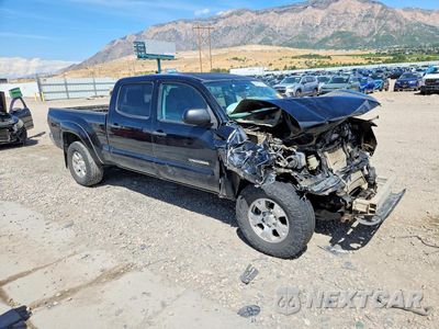 Czwarte zdjęcie samochodu z boku: 2014 TOYOTA TACOMA DOUBLE CAB LONG BED VIN:3TMMU4FN7EM064072 - miniatura