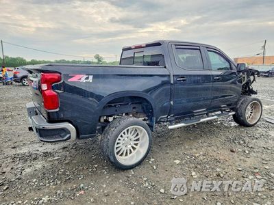 Trzecie zdjęcie samochodu z tyłu: 2019 CHEVROLET SILVERADO K1500 LT VIN:3GCUYDEDXKG107875 - miniatura