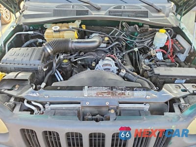 Zdjęcie 12 z 13 samochodu: 2004 JEEP LIBERTY SPORT VIN:1J4GK48K74W107307 - miniatura