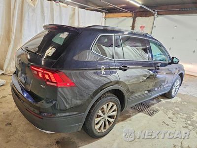 Trzecie zdjęcie samochodu z tyłu: 2018 VOLKSWAGEN TIGUAN S VIN:3VV1B7AX0JM126328 - miniatura
