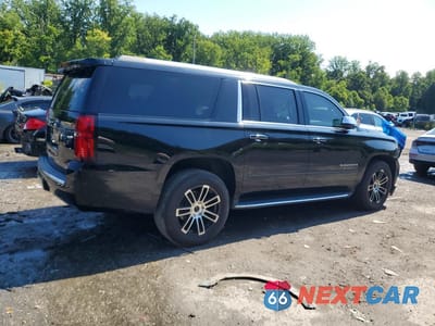 Trzecie zdjęcie samochodu z tyłu: 2017 CHEVROLET SUBURBAN K1500 PREMIER VIN:1GNSKJKC0HR124221 - miniatura