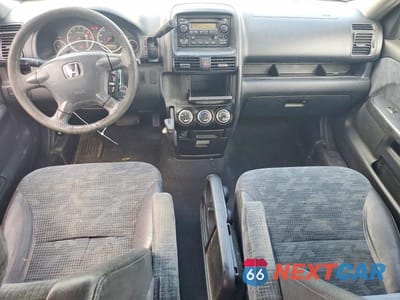 Zdjęcie 8 z 13 samochodu: 2004 HONDA CR-V LX VIN:SHSRD68424U209035 - miniatura