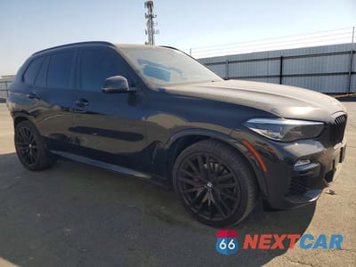 Czwarte zdjęcie samochodu z boku: 2021 BMW X5 XDRIVE40I VIN:5UXCR6C00M9F45975 - miniatura