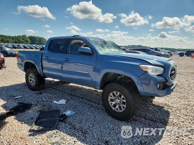 Czwarte zdjęcie samochodu z boku: 2019 TOYOTA TACOMA SR5 V6 VIN:3TMCZ5AN5KM220499 - miniatura