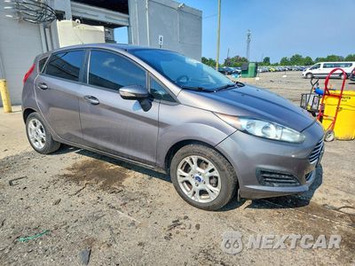 Czwarte zdjęcie samochodu z boku: 2014 FORD FIESTA SE VIN:3FADP4EJ6EM216208 - miniatura