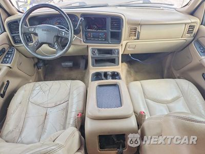 Zdjęcie 8 z 13 samochodu: 2004 GMC YUKON VIN:1GKEK13ZX4J174968 - miniatura