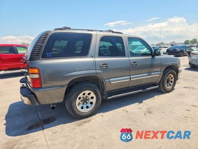 Trzecie zdjęcie samochodu z tyłu: 2001 CHEVROLET TAHOE C1500 VIN:1GNEC13T61R177908 - miniatura