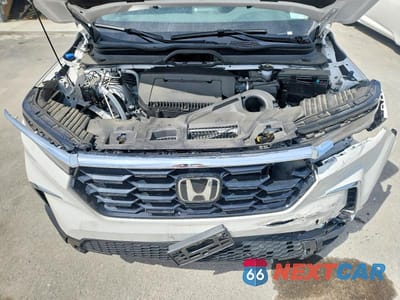 Zdjęcie 12 z 13 samochodu: 2025 HONDA PILOT TOURING VIN:5FNYG1H78SB120347 - miniatura