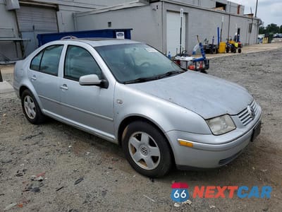 Czwarte zdjęcie samochodu z boku: 2002 VOLKSWAGEN JETTA GLS VIN:3VWSK69M62M194901 - miniatura