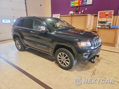Czwarte zdjęcie samochodu z boku: 2015 JEEP GRAND CHEROKEE LIMITED VIN:1C4RJFBG1FC184633 - miniatura