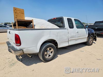 Trzecie zdjęcie samochodu z tyłu: 2003 FORD F150 VIN:2FTRX17233CA17940 - miniatura