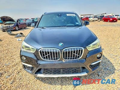 Piąte zdjęcie samochodu w środku: 2017 BMW X1 SDRIVE28I VIN:WBXHU7C30H5H34552 - miniatura