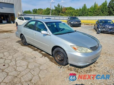 Czwarte zdjęcie samochodu z boku: 2002 TOYOTA CAMRY LE VIN:4T1BE32K52U050765 - miniatura