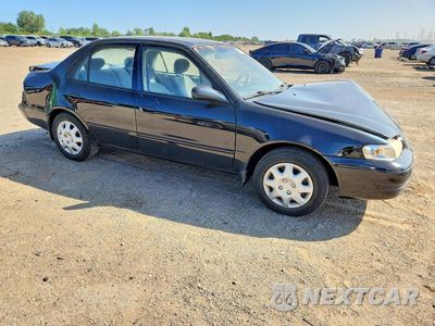 Czwarte zdjęcie samochodu z boku: 1999 TOYOTA COROLLA VE VIN:1NXBR12EXXZ214618 - miniatura