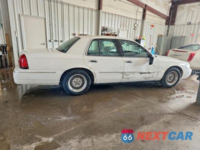 Trzecie zdjęcie samochodu z tyłu: 2000 MERCURY GRAND MARQUIS LS VIN:2MEFM75W7YX636530 - miniatura