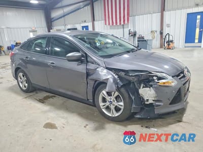 Czwarte zdjęcie samochodu z boku: 2012 FORD FOCUS SE VIN:1FAHP3F20CL390969 - miniatura