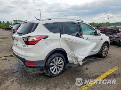 Trzecie zdjęcie samochodu z tyłu: 2017 FORD ESCAPE TITANIUM VIN:1FMCU0JD9HUD74660 - miniatura