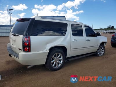 Trzecie zdjęcie samochodu z tyłu: 2011 GMC YUKON DENALI VIN:1GKS2MEF0BR394528 - miniatura