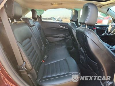 Zdjęcie 10 z 12 samochodu: 2021 FORD EDGE SEL VIN:2FMPK4J93MBA58455 - miniatura
