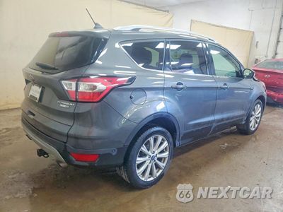 Trzecie zdjęcie samochodu z tyłu: 2018 FORD ESCAPE TITANIUM VIN:1FMCU9J99JUA21194 - miniatura