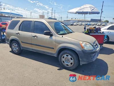 Czwarte zdjęcie samochodu z boku: 2006 HONDA CR-V LX VIN:JHLRD68596C010843 - miniatura