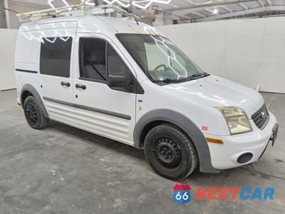 Czwarte zdjęcie samochodu z boku: 2011 FORD TRANSIT CONNECT XLT VIN:NM0LS7BN8BT043976 - miniatura