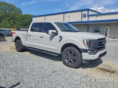 Czwarte zdjęcie samochodu z boku: 2023 FORD F150 SUPERCREW VIN:1FTFW1E80PKF40704 - miniatura