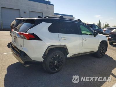 Trzecie zdjęcie samochodu z tyłu: 2022 TOYOTA RAV 4 XSE HYBIRD VIN:JTME6RFV9ND527238 - miniatura