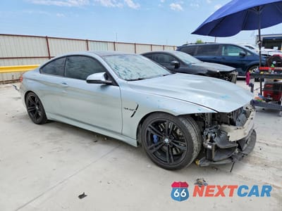 Czwarte zdjęcie samochodu z boku: 2015 BMW M4 VIN:WBS3R9C52FK331022 - miniatura