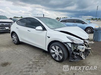 Czwarte zdjęcie samochodu z boku: 2024 TESLA MODEL Y VIN:7SAYGDEE0RA259452 - miniatura