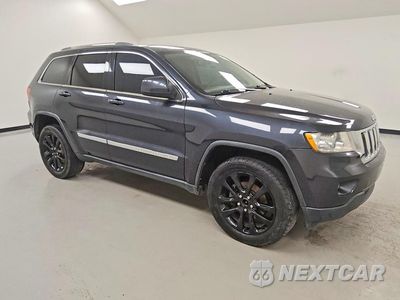 Czwarte zdjęcie samochodu z boku: 2012 JEEP GRAND CHEROKEE LAREDO VIN:1C4RJFAG0CC341419 - miniatura